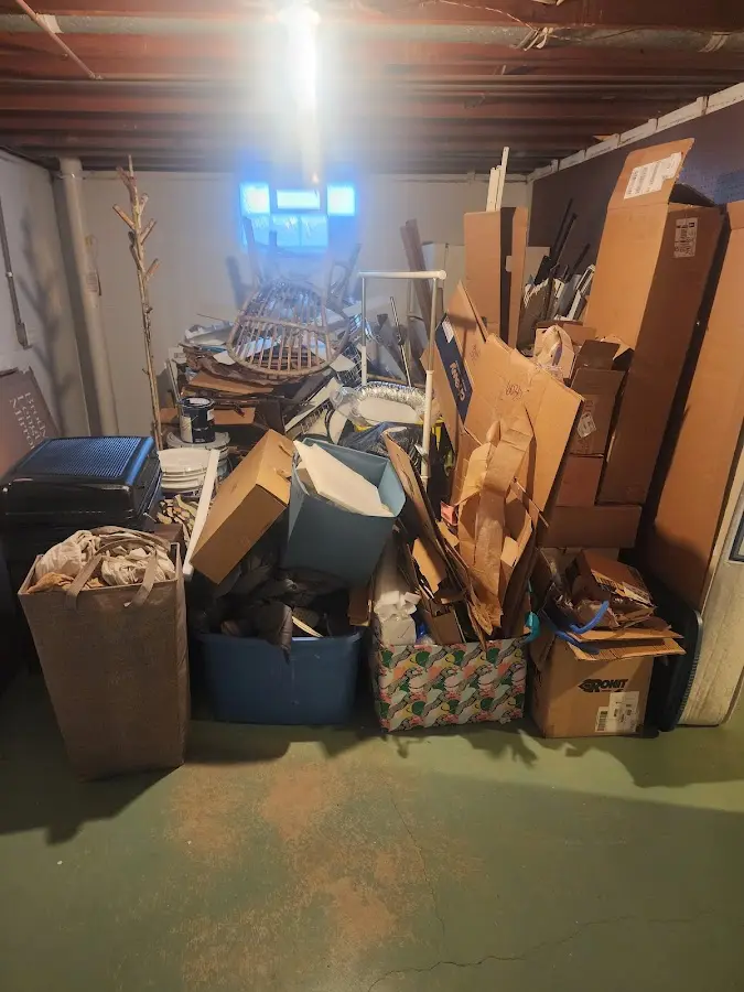 Roll-off dumpster container at job site for 2 Yard Dumpster Rental in Penns Grove